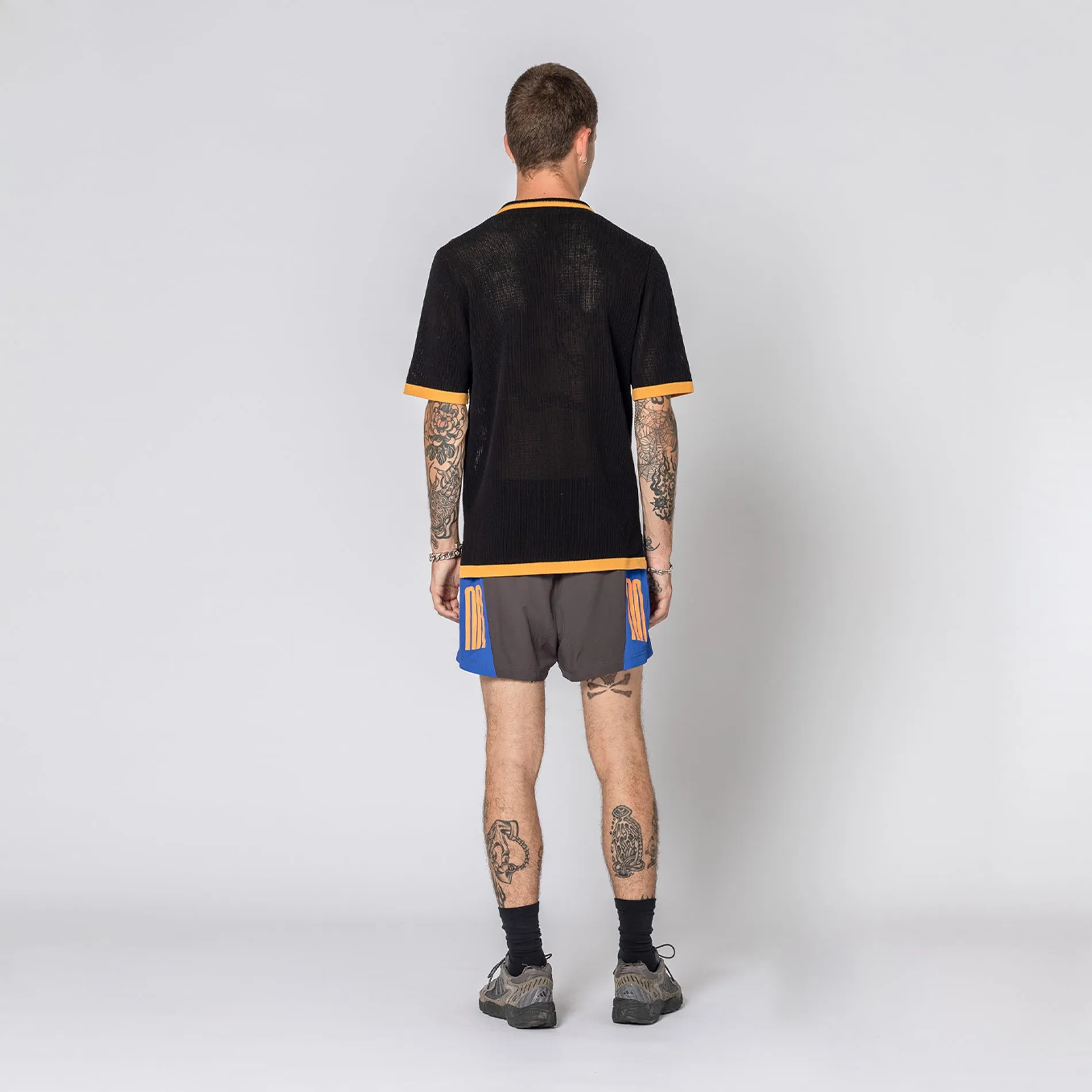 BLACK AND GOLD KNIT SHIRT